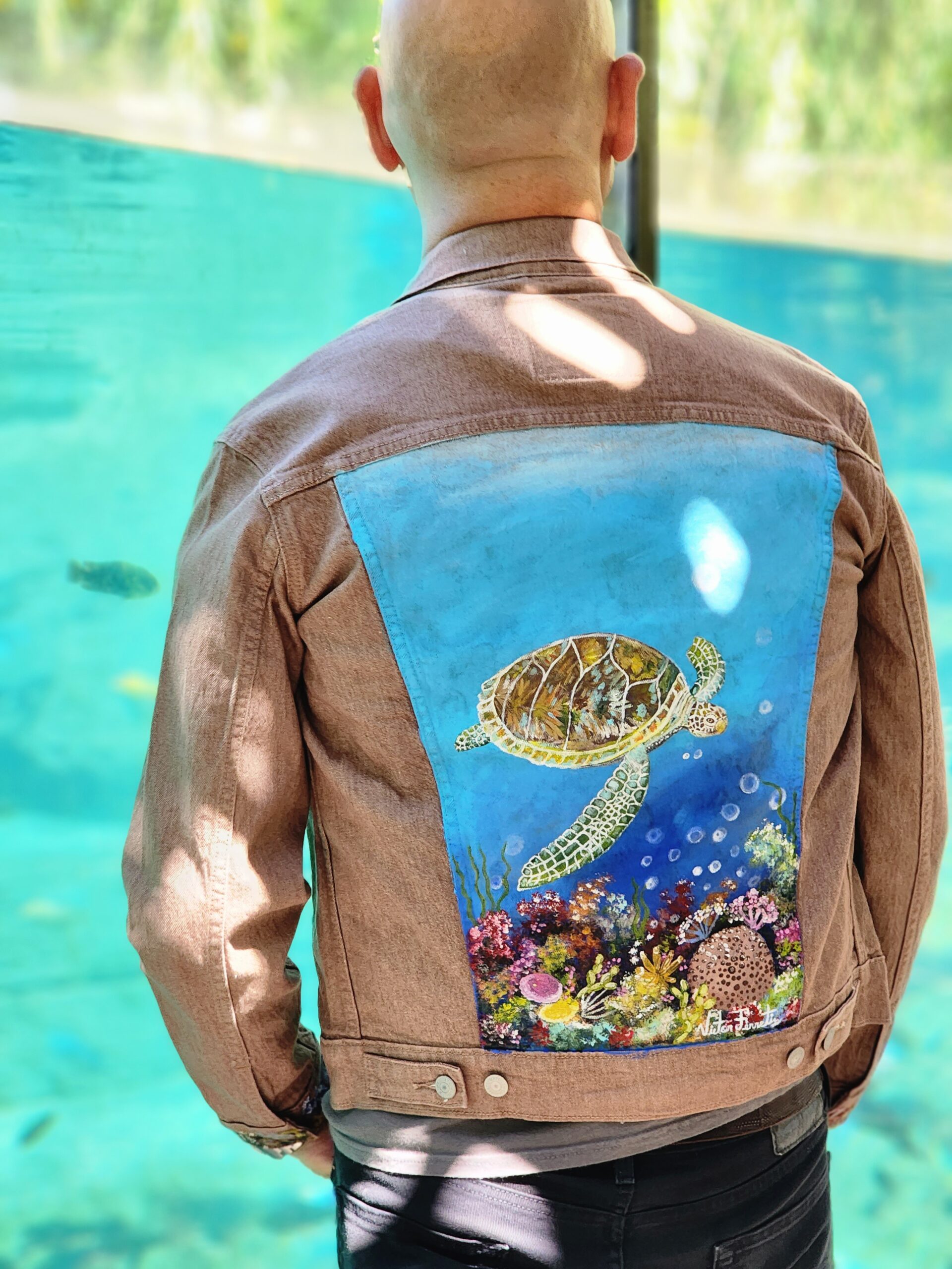 This garment is a one-of-a-kind hand-painted denim jacket with acrylic textile paint. This beautiful jacket has been heat-pressed so the jacket is machine washable.