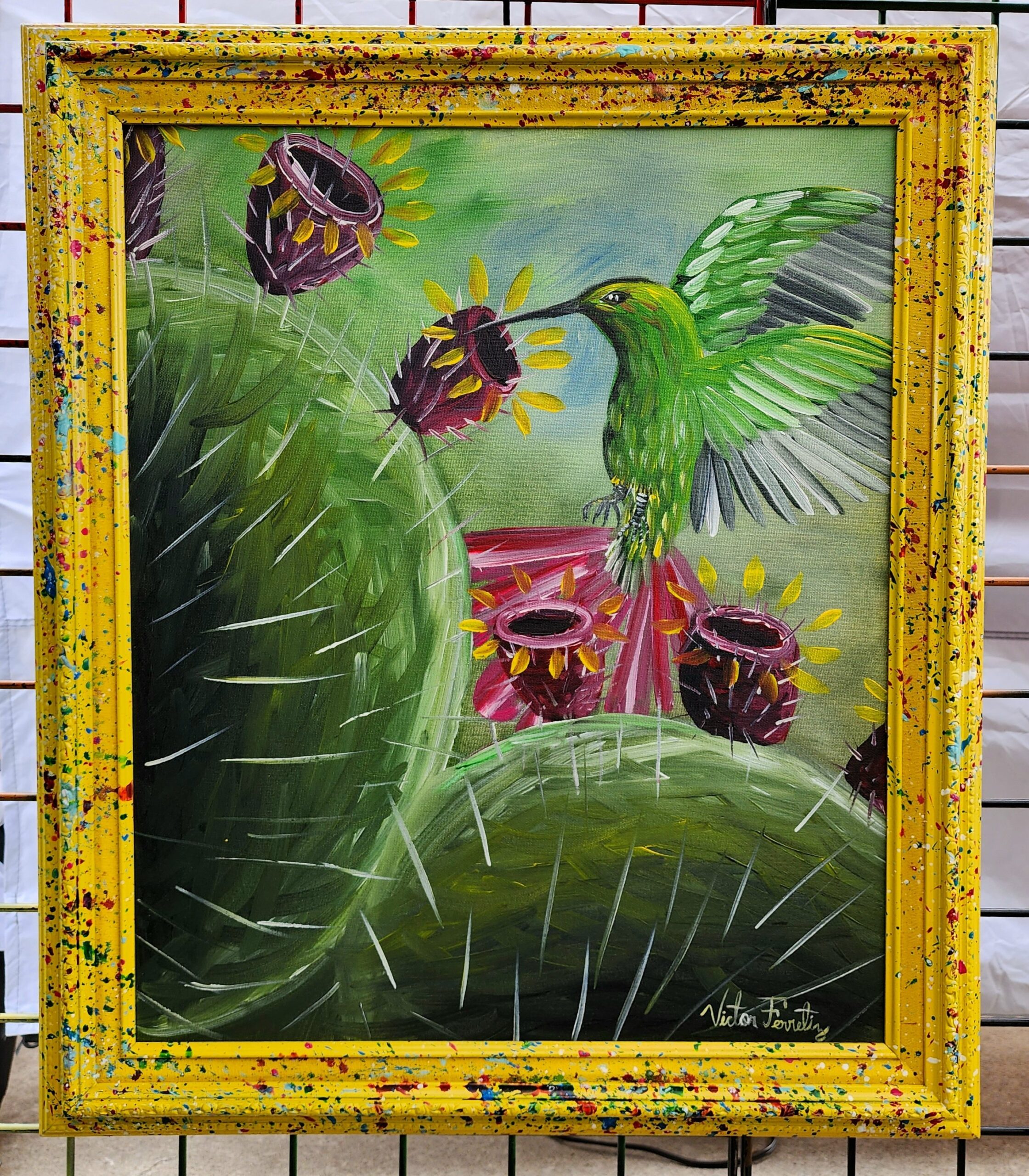 This is a painting of a hummingbird flying over some beautiful cacti with juicy prickly pears. The painting is already framed and ready to hang on your beautiful and warming home. Abstract style.