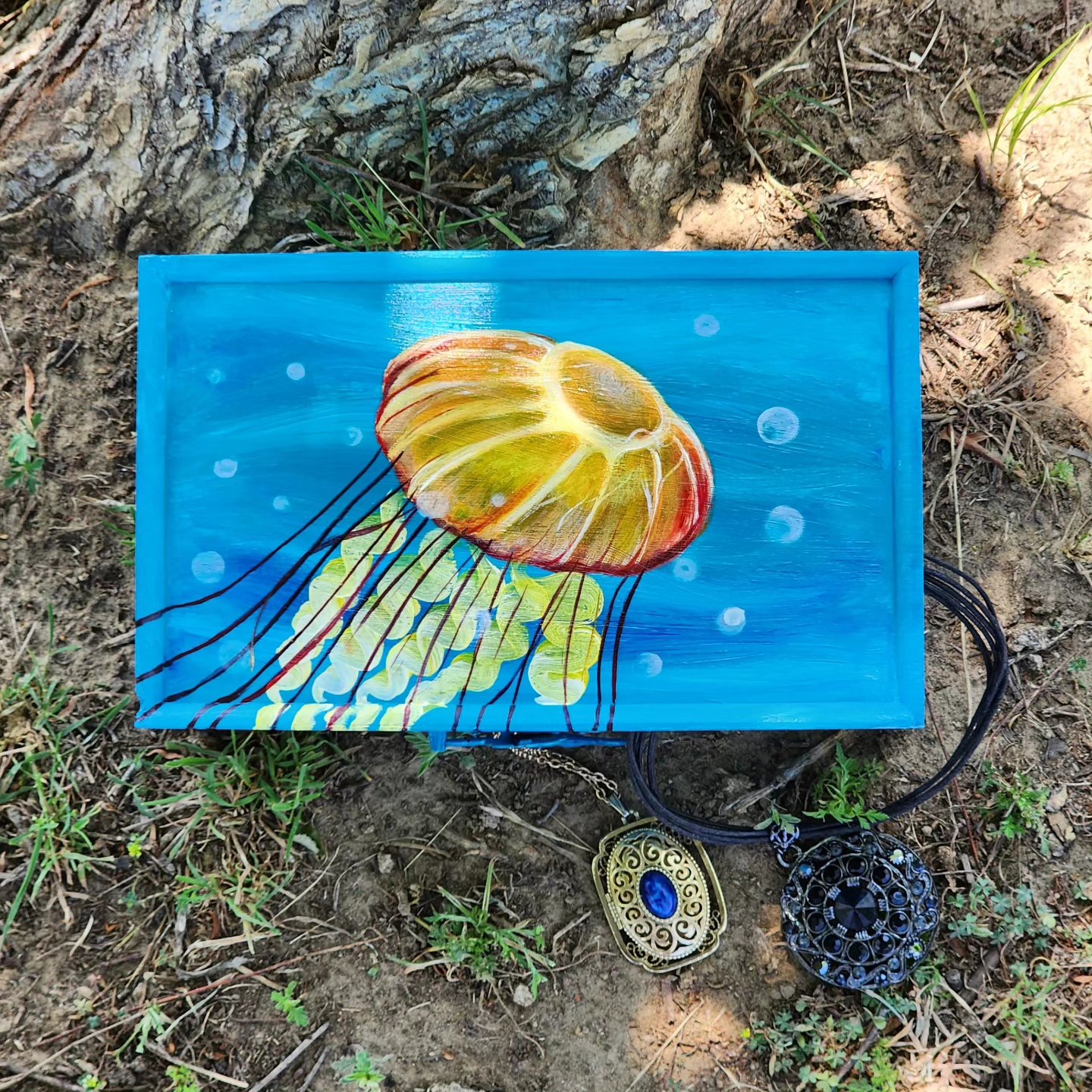 Beautiful handpainted wooden trinket box with a mirror. This cute trinket box is an ideal gift for a special loved one. You can store jewelry such as rings, necklaces, bracelets, or anything you would like to keep in a particular place, especially in this elegant and artistic trinket box.
