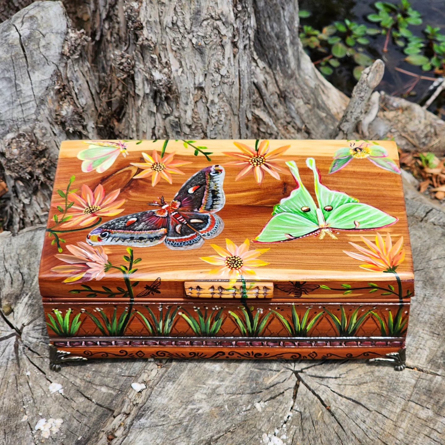 Handpainted antique wooden jewelry box with original design of moths and flowers. Beautiful handpainted wooden trinket box with a mirror. This cute trinket box is an ideal gift for a special loved one. You can store jewelry such as rings, necklaces, bracelets, or anything you would like to keep in a particular place, especially in this elegant and artistic trinket box.