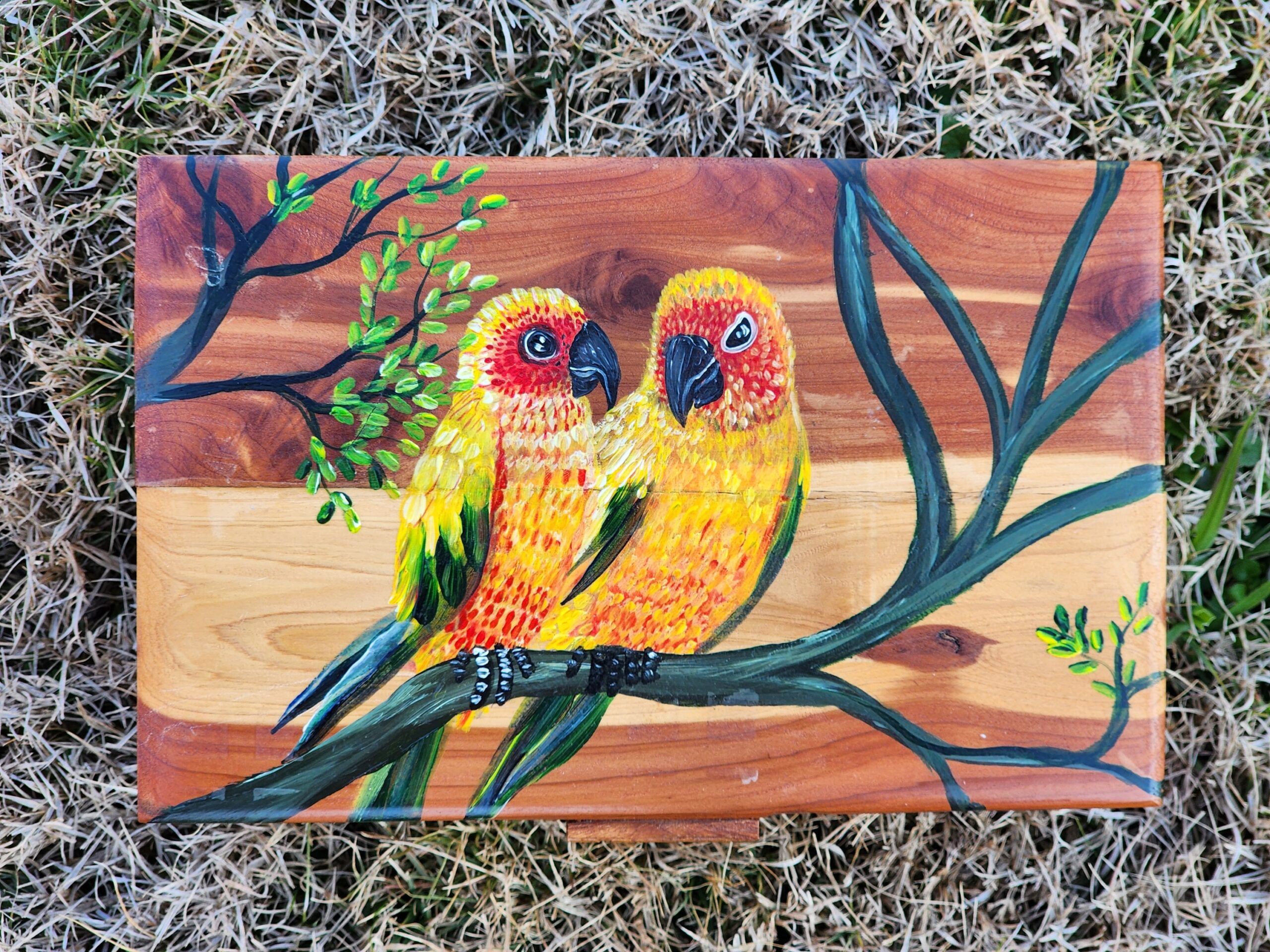 Antique Wooden jewelry box. This box was repurposed into this beautiful jewelry box and handpainted with a colorful pair of love birds.
