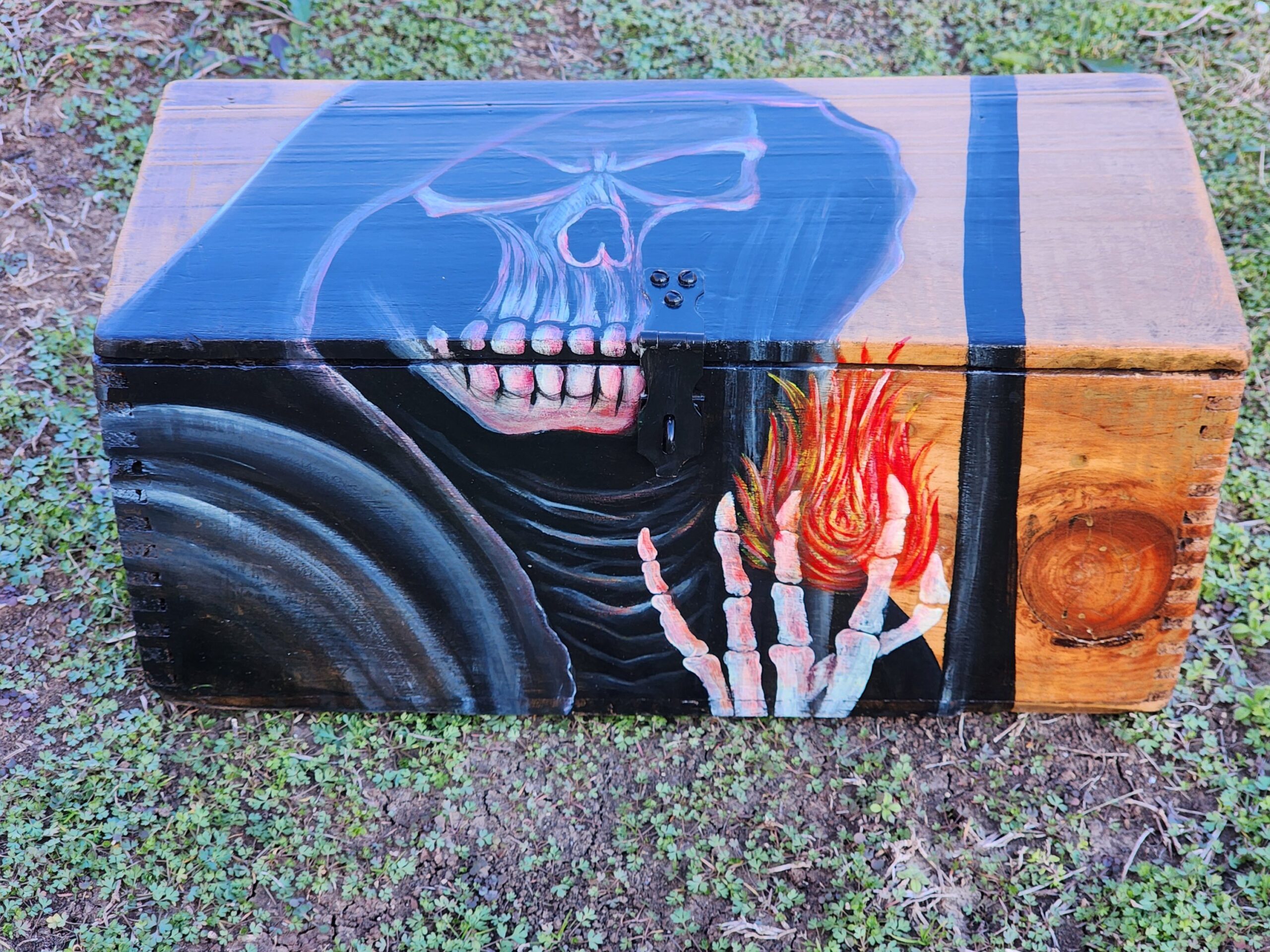 Repurposed antique wooden jewelry box. Handpainted design of a grim reaper. Original hinges and lock.