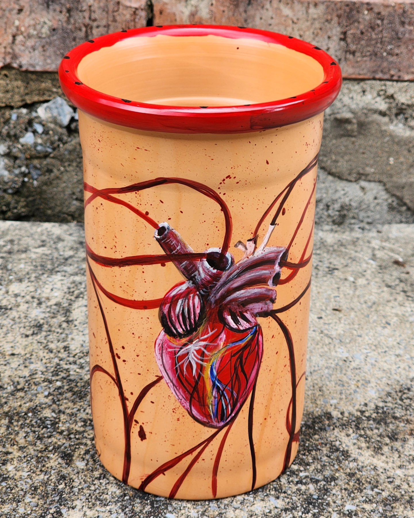 It’s one of a kind handpainted terra cotta vase. Decorative purposes. Not for food or liquids.