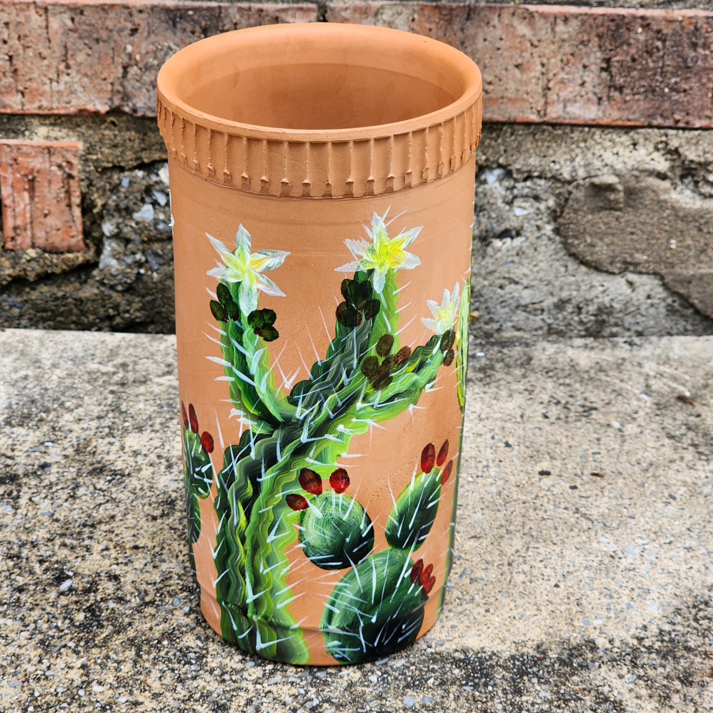 It’s one of a kind handpainted terra cotta vase. Decorative purposes. Not for food or liquids.