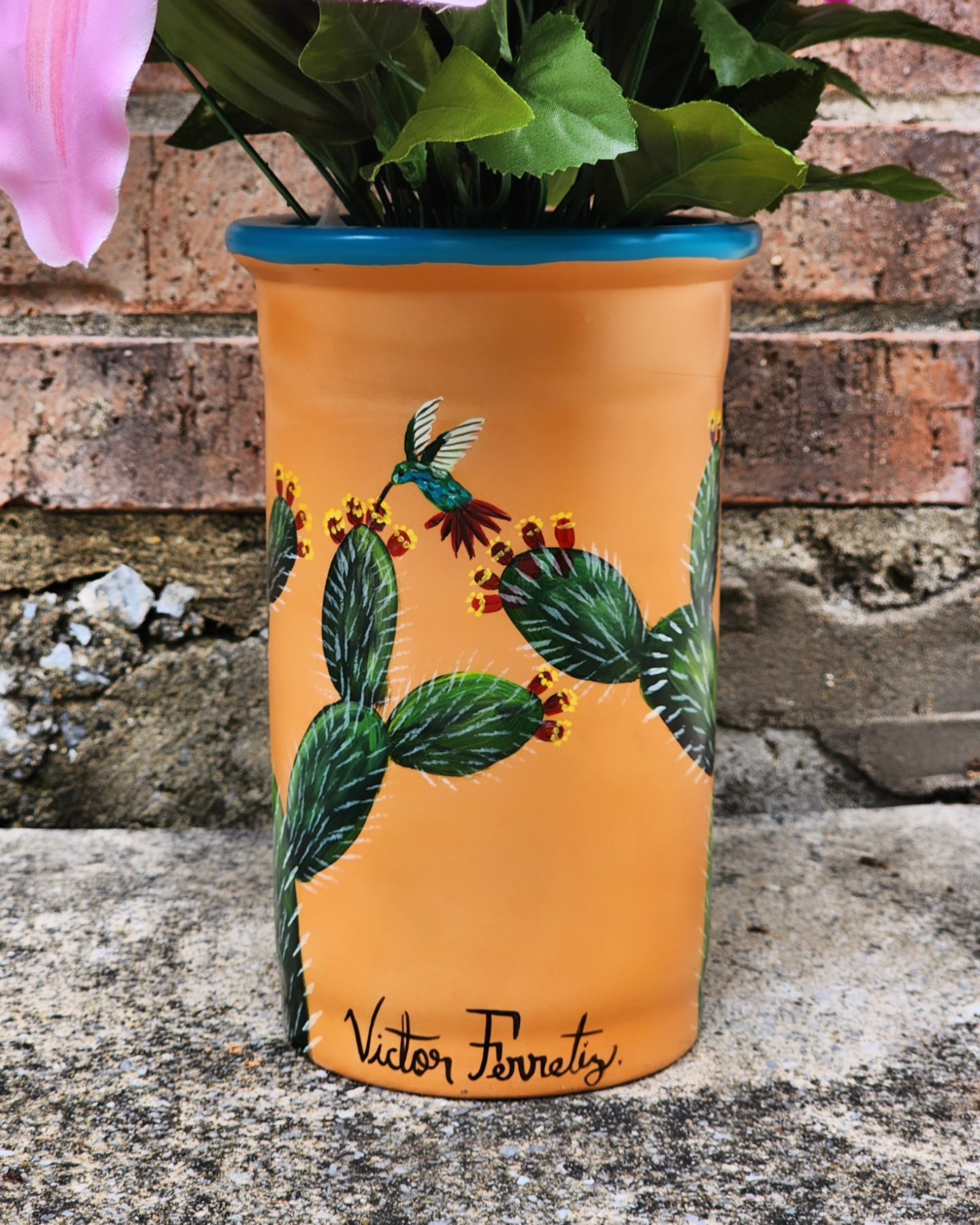 It’s one of a kind handpainted terra cotta vase. Decorative purposes. Not for food or liquids.