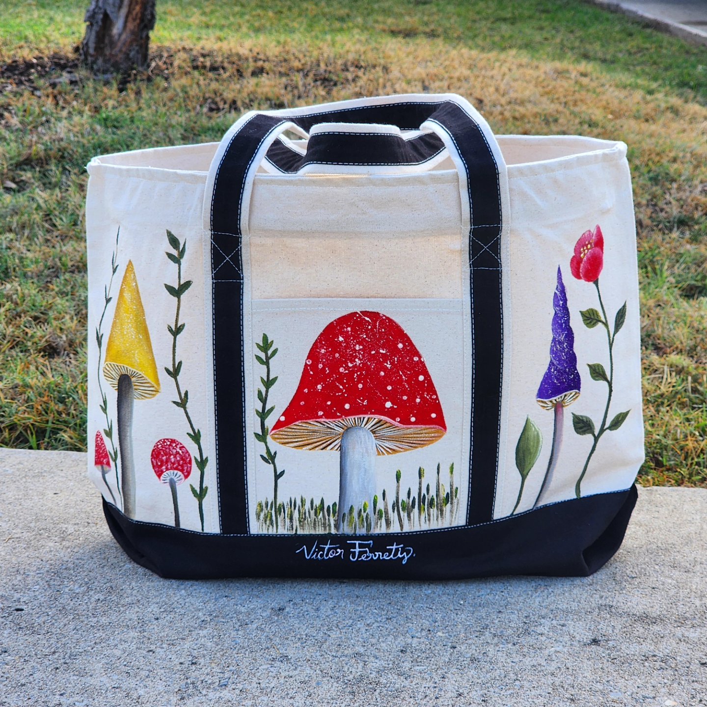 This is a big tote bag with lots of space, and it is handpainted with textile paint on tote. I painted some mushrooms and flowers in front and back of the bag. Size: 21x14 inches. Washer and dryer safe.