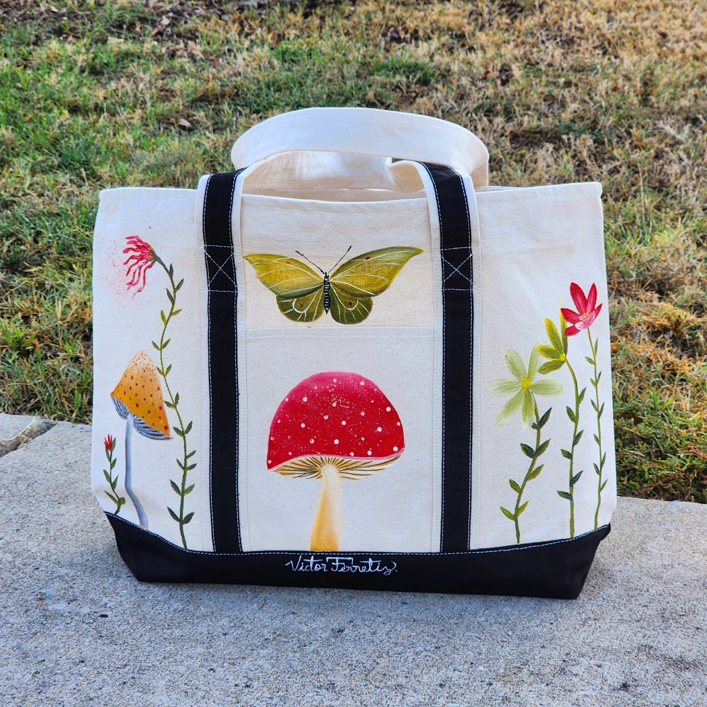 This is a big tote bag with lots of space, and it is handpainted with textile paint on tote. I painted some mushrooms and butterflies. Size: 21×14 inches. Washer and dryer safe.