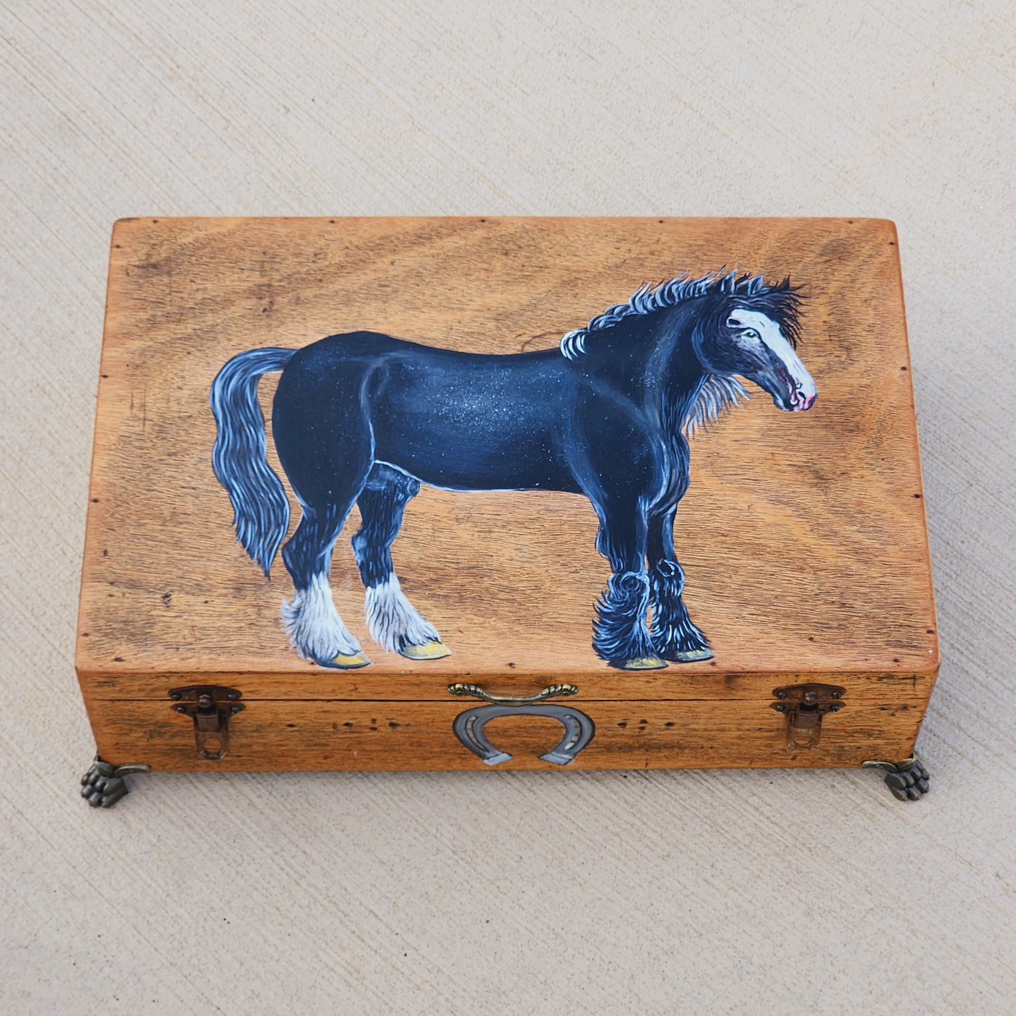 British 1828 oak antique box was repurposed into a trinket box with a majestic design of Old English Black, which was a breed that was extinct in 1601. During the time of the Norman Conquest in 1066, the Normans may have taken some of the Great Horses from Europe across the English Channel and bred them with native Horses. Eventually, a distinct type evolved that was known as the Old English Black Horse.