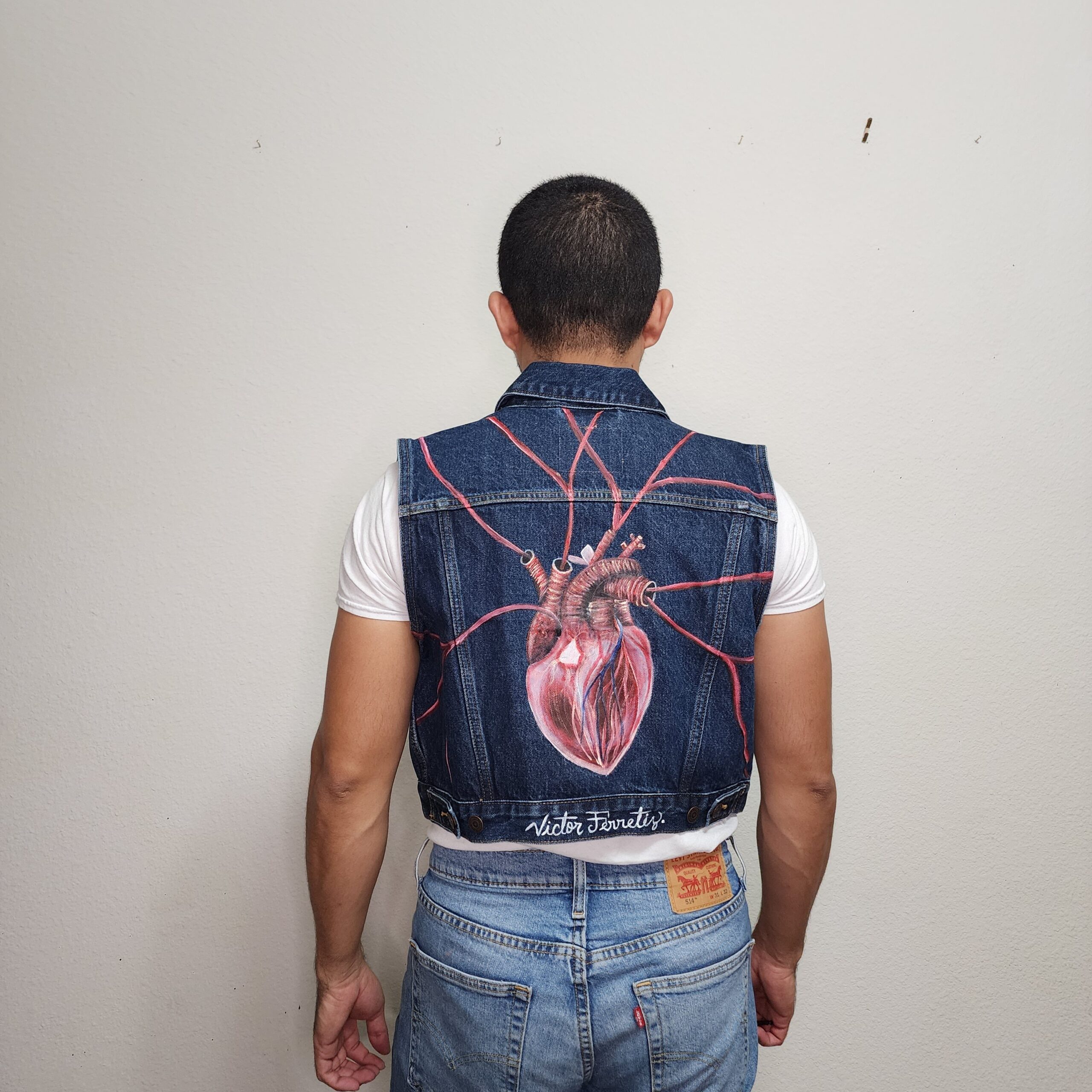 Handpainted brand-new denim vest with textile paint. Washer and dryer safe. Size: women's L