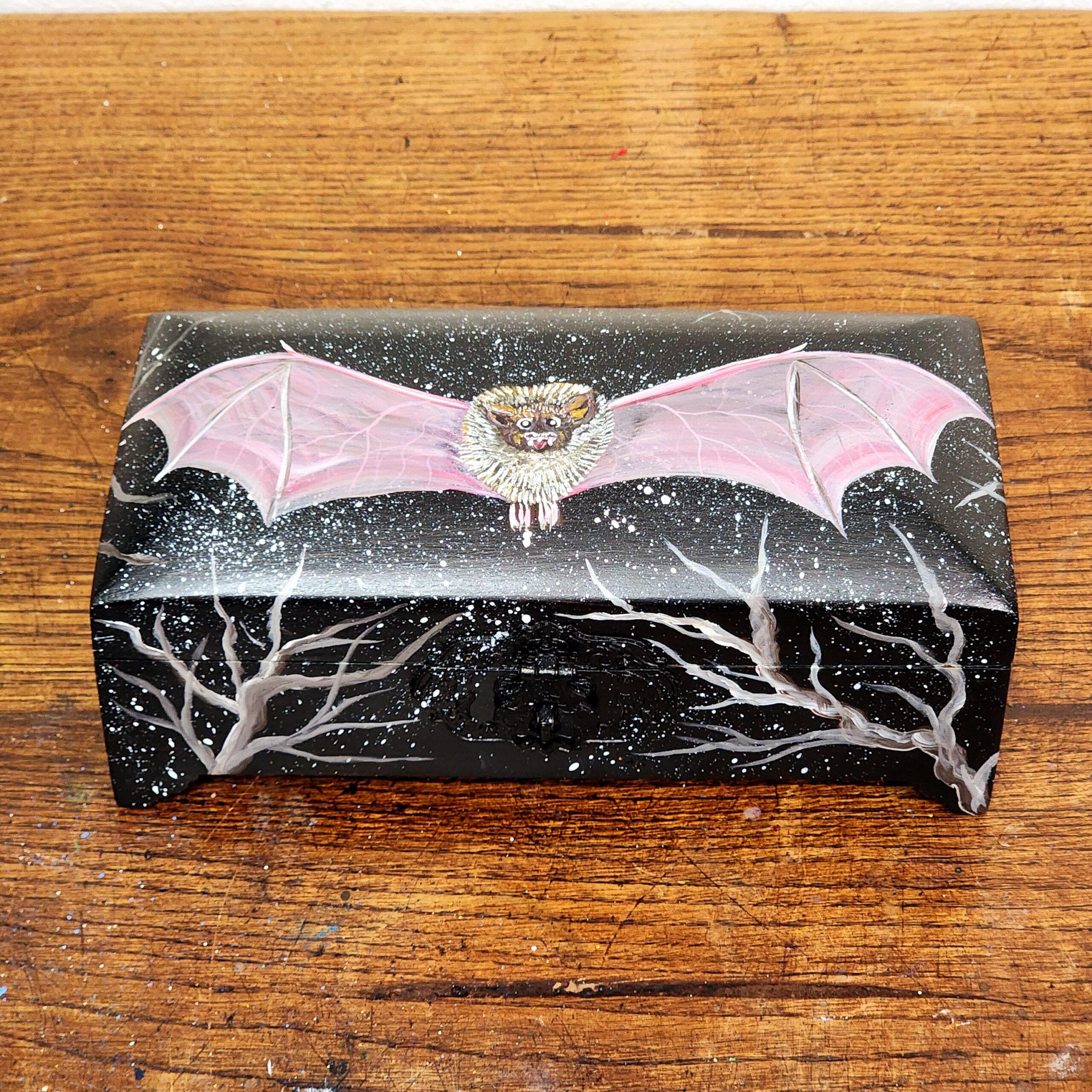 Handpainted wooden jewelry box with a bat design. Box design as a coffin.