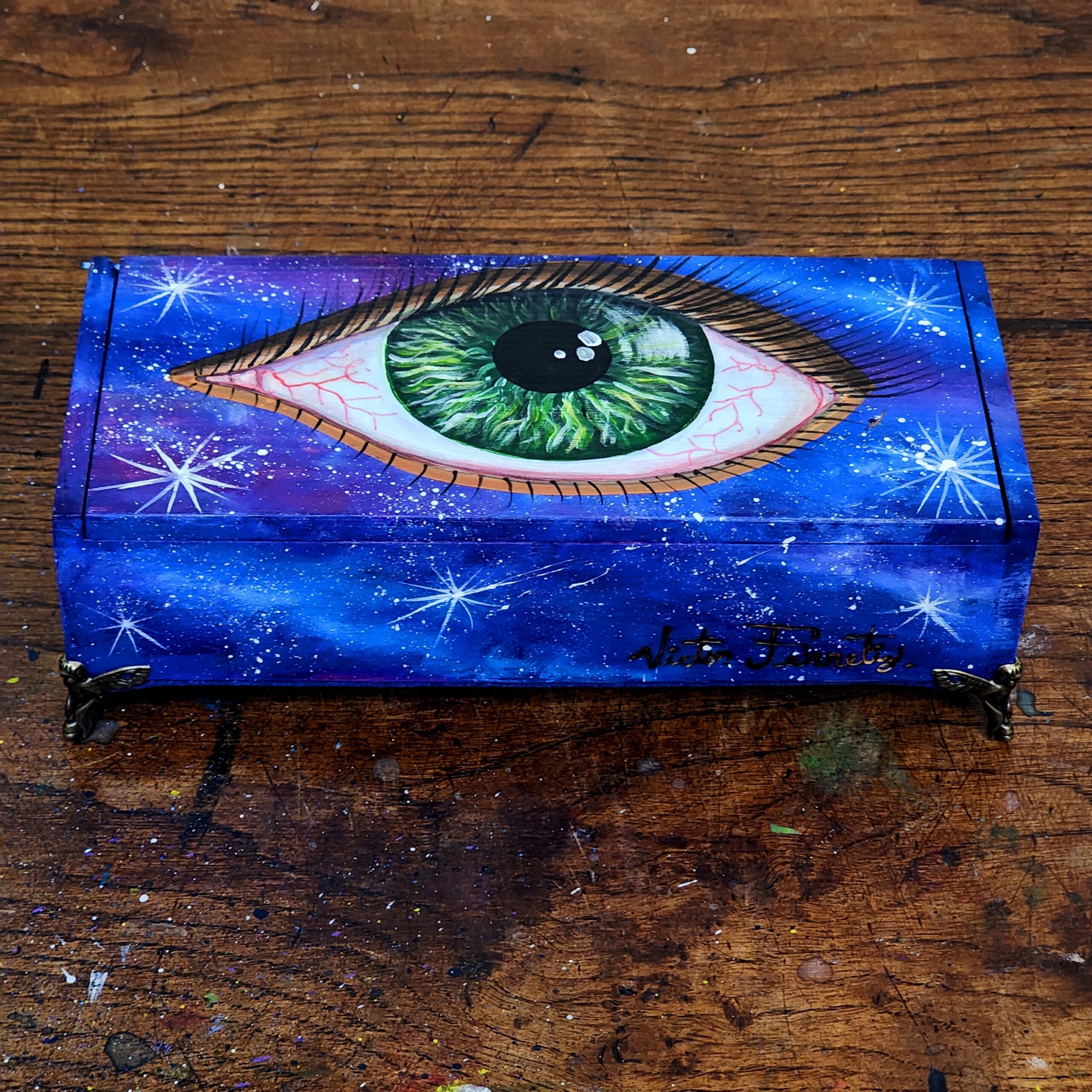 Handpainted jewelry wooden box with original design of a green eye.