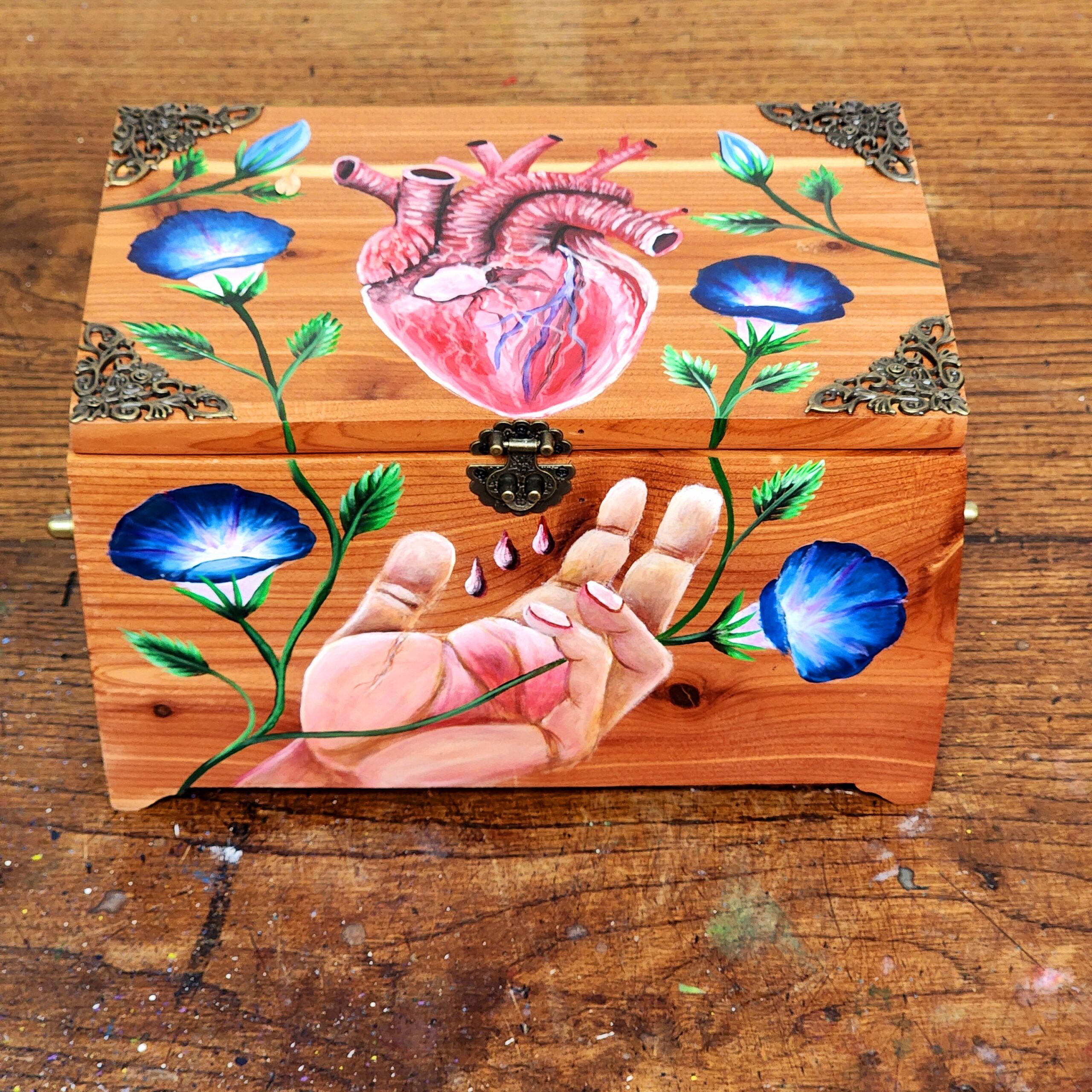 Beautiful handpainted wooden trinket box with a majestic design of an anatomical heart and hands with morning glories. Cedar box.