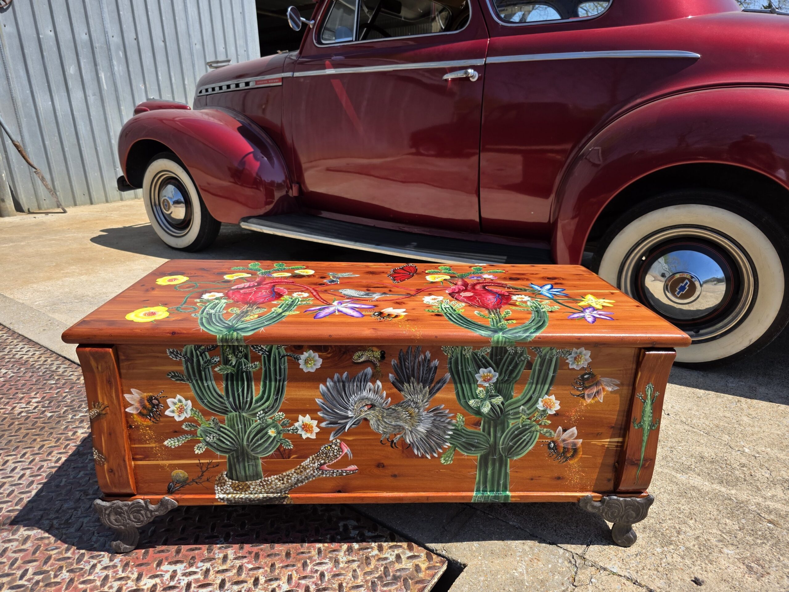 Handpainted Cedar Chest Circa 1804 Acrylic on cedar 18.5″ H x 19″ D x 42″ W Original hardware, but feet & handles.